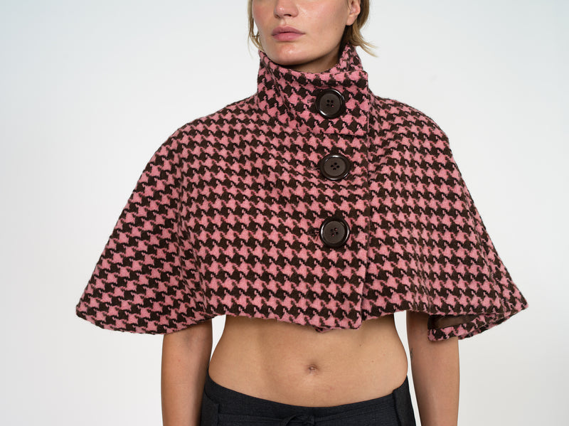 Cap buttoned to the top