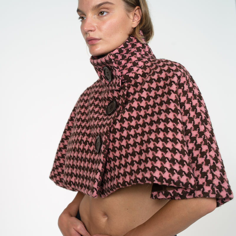 Cap buttoned to the top