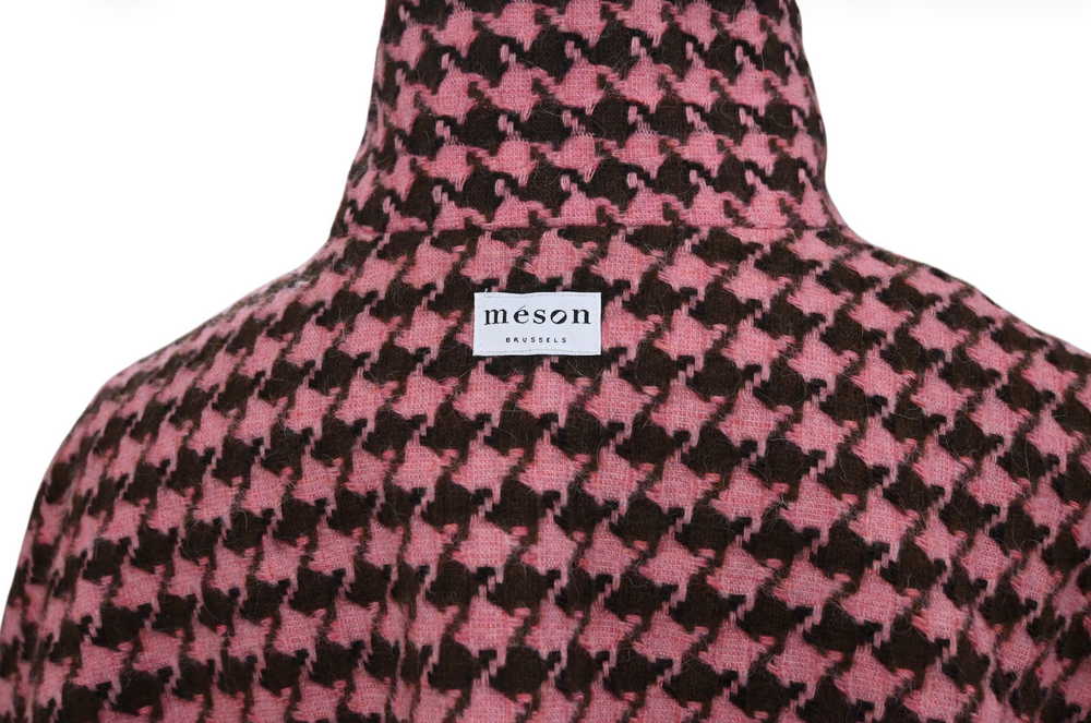 Cap buttoned to the top